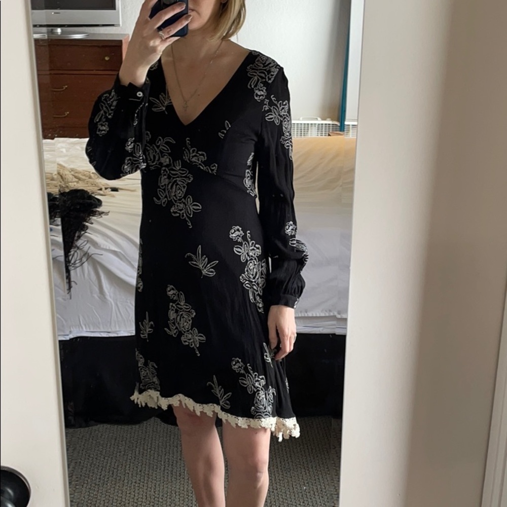 Black dress with lace hem